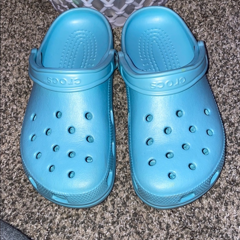 Light blue crocs.